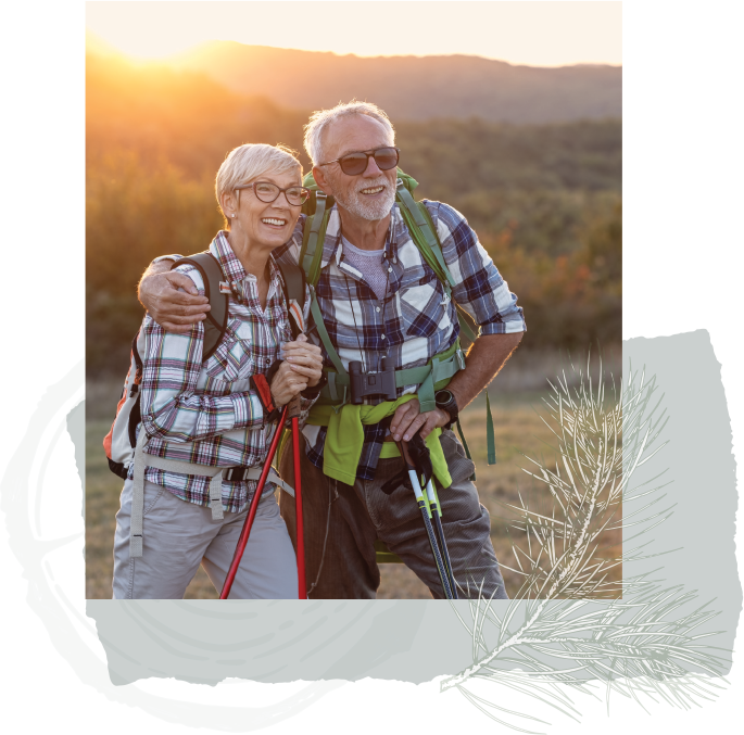 Man and Woman Hugging Watching the Sunset on a Walk