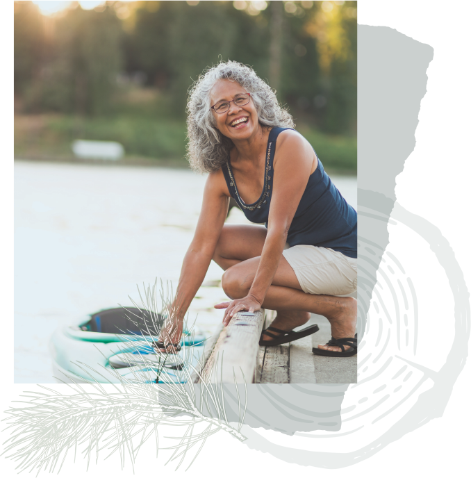 Woman Standing By a Lake